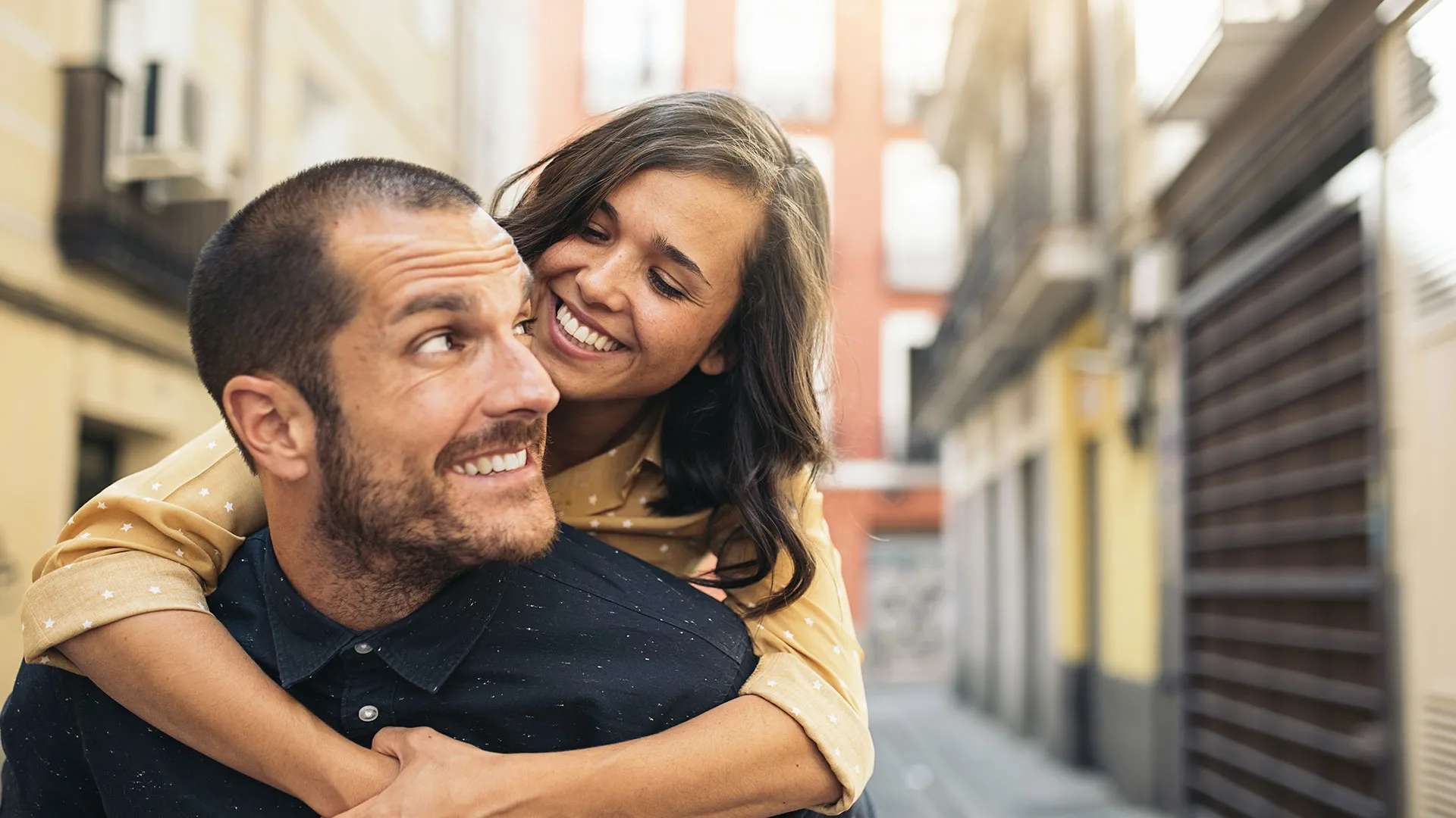Smiling couple enjoying healthy smiles